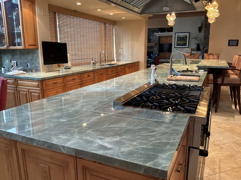Cooktop run with a thick polished quartzite edge