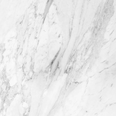 Close-up of a white marble-look slab surface